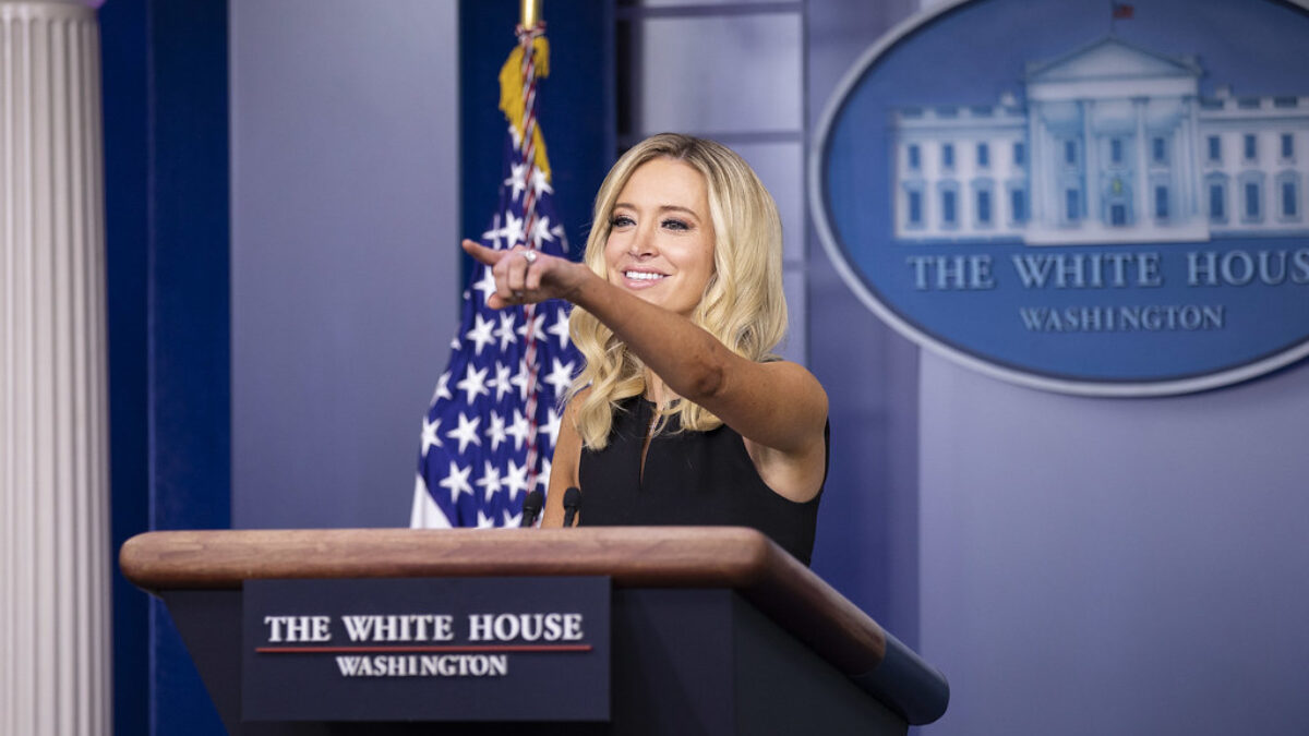 Kayleigh McEnany smiles as she calls on a reporter during a press briefing