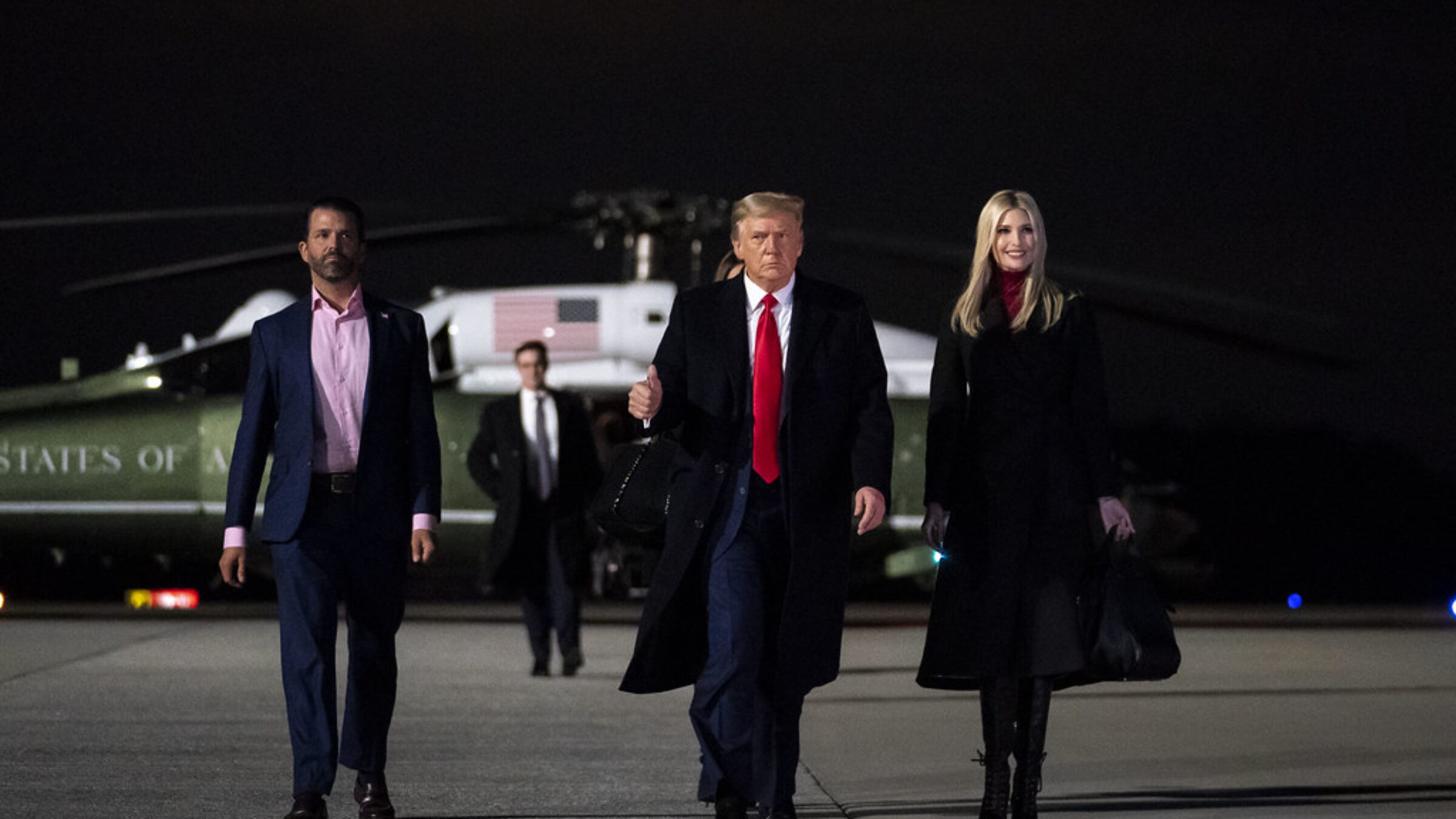Donald Trump, Ivanka Trump, and Jared Kushner walk away from Marine One