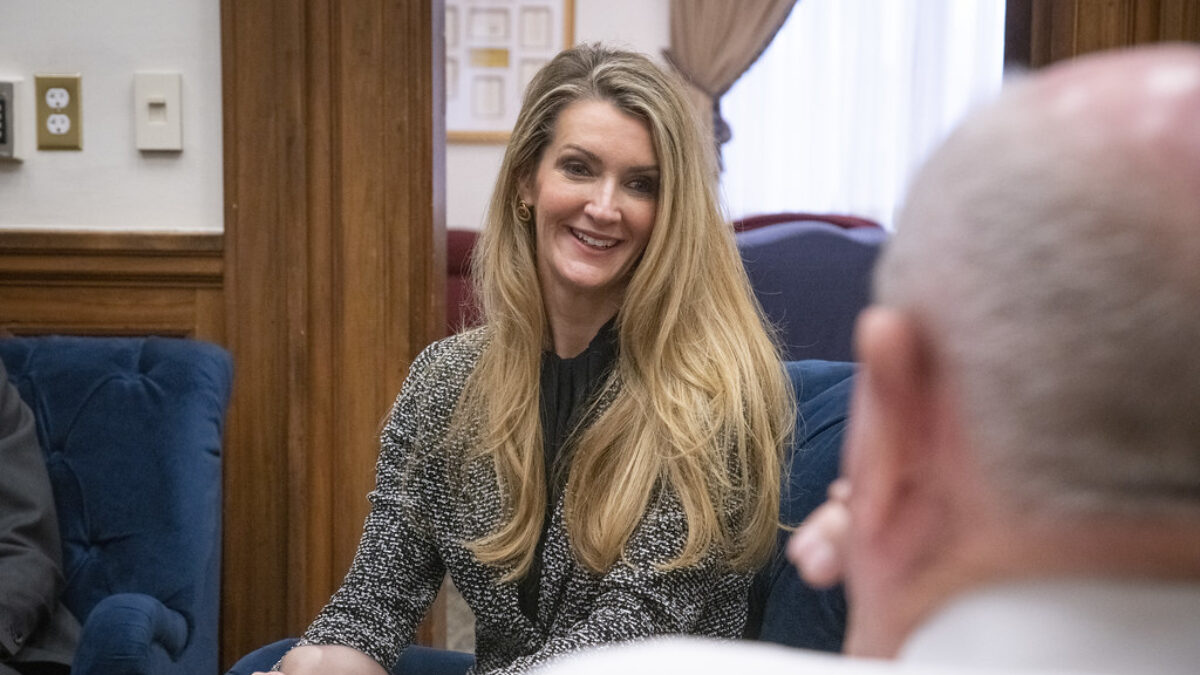 Kelly Loeffler smiles during a conversation