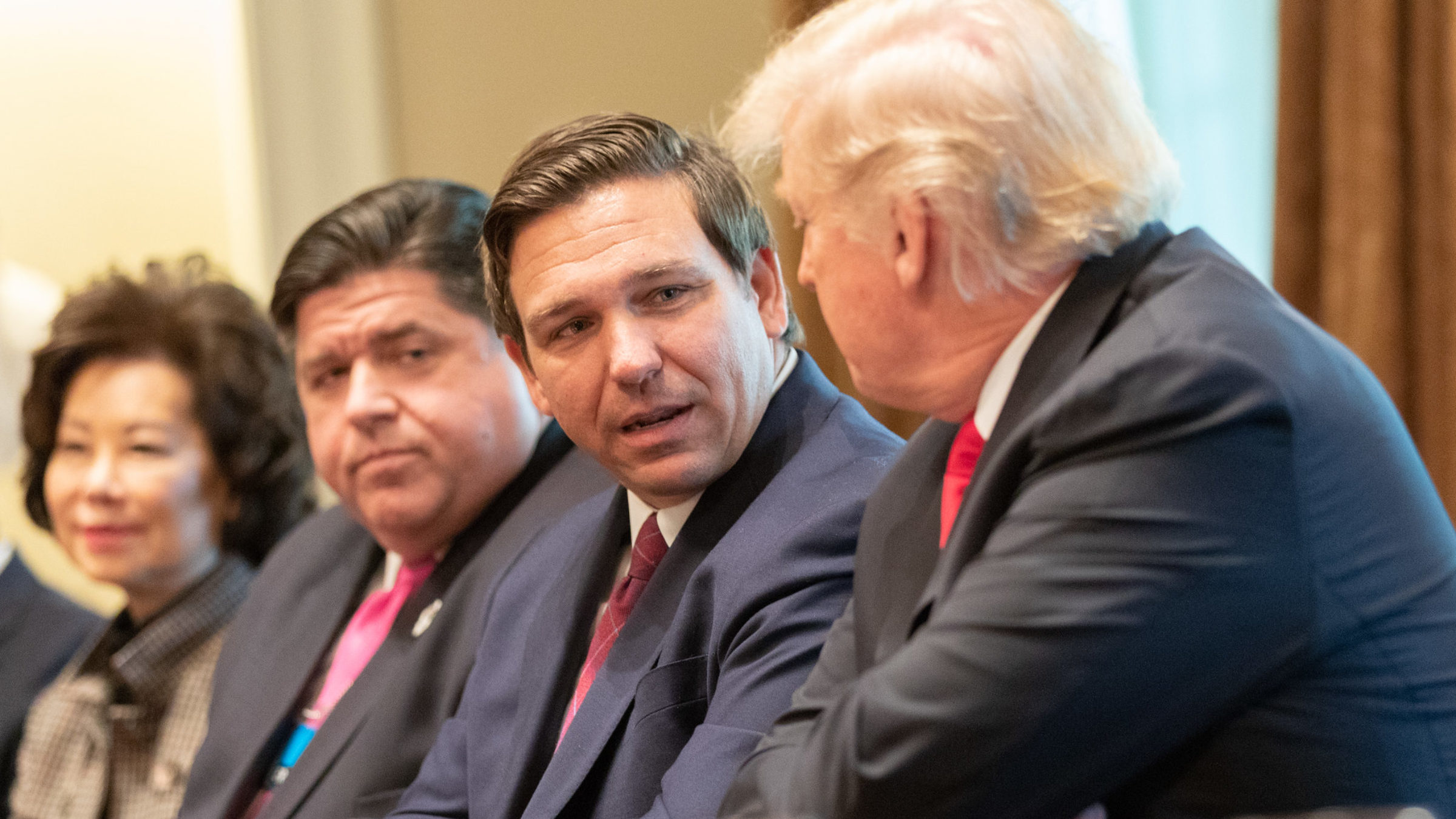 Donald Trump has a conversation with Florida Governor Ron DeSantis