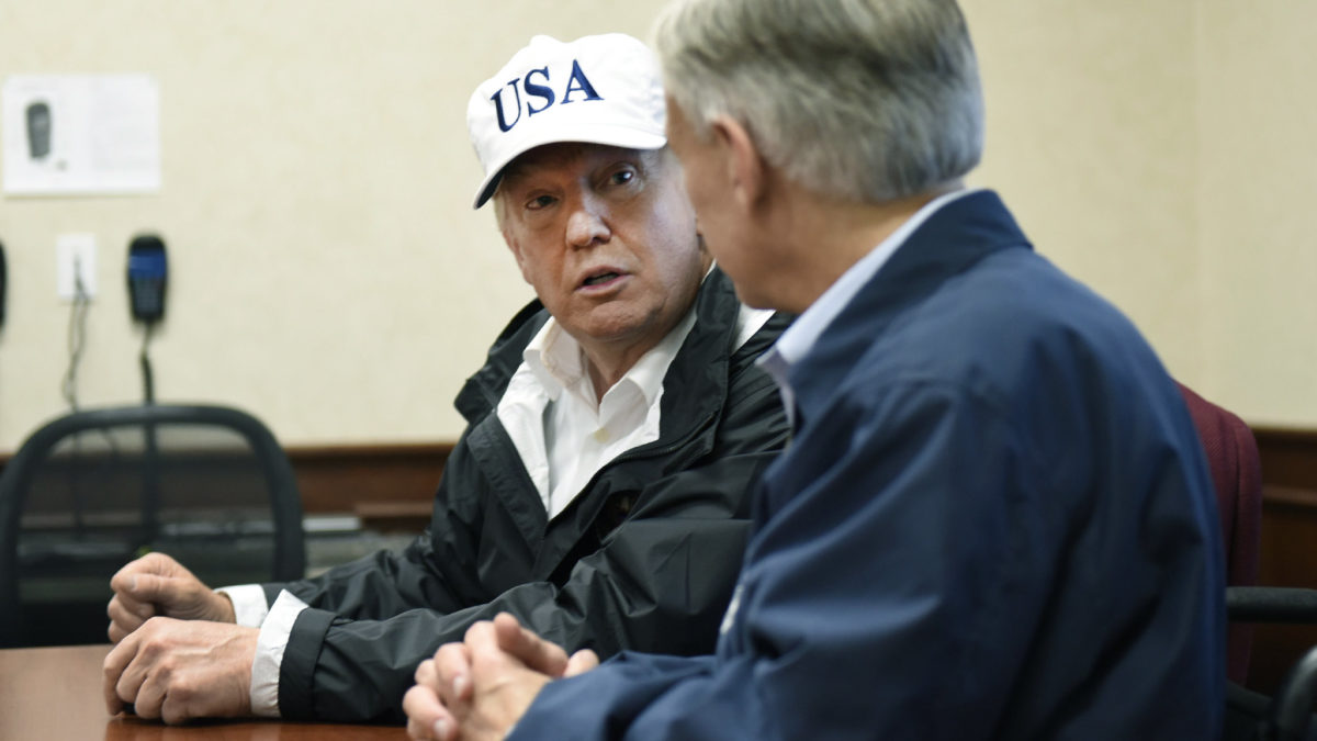 Donald Trump wearing white campaign hat