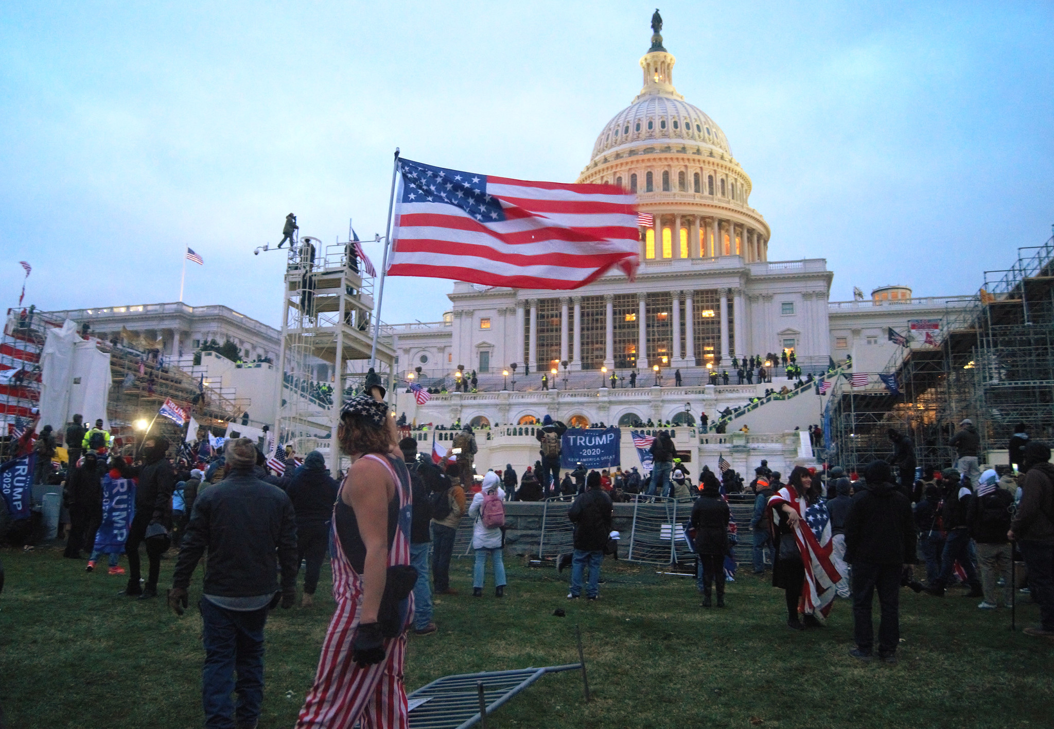 The U.S. Capitol during the insurrection at dusk