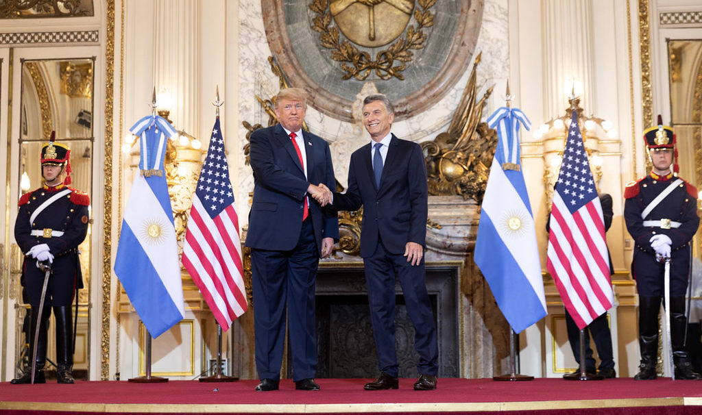 President Trump shakes hands with Alberto Fernández, the Argentinian President